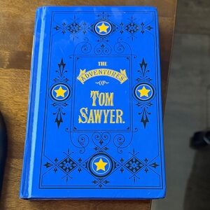Blue 'The Adventures of Tom Sawyer' Book
